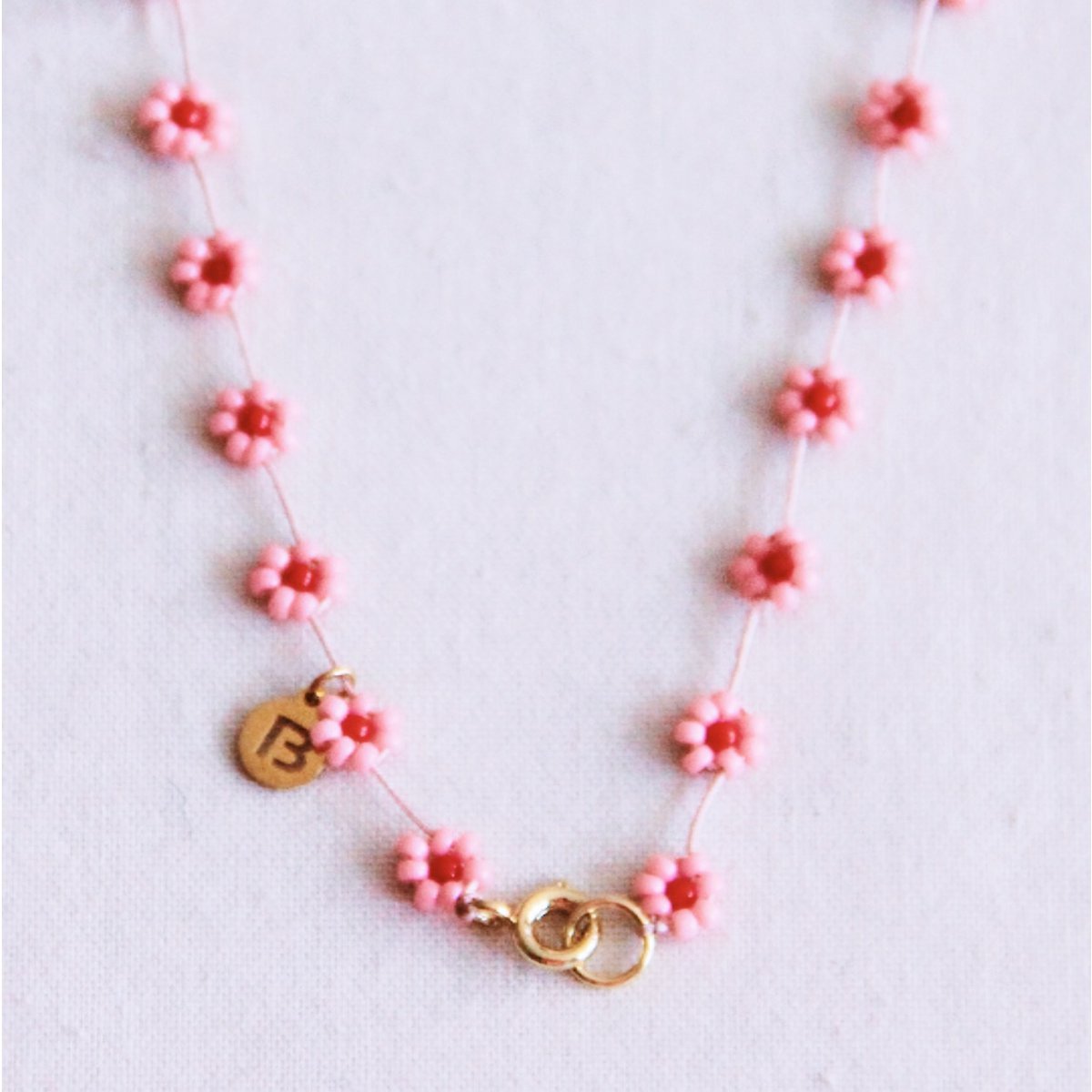 Daisy bloem ketting - roze/rood