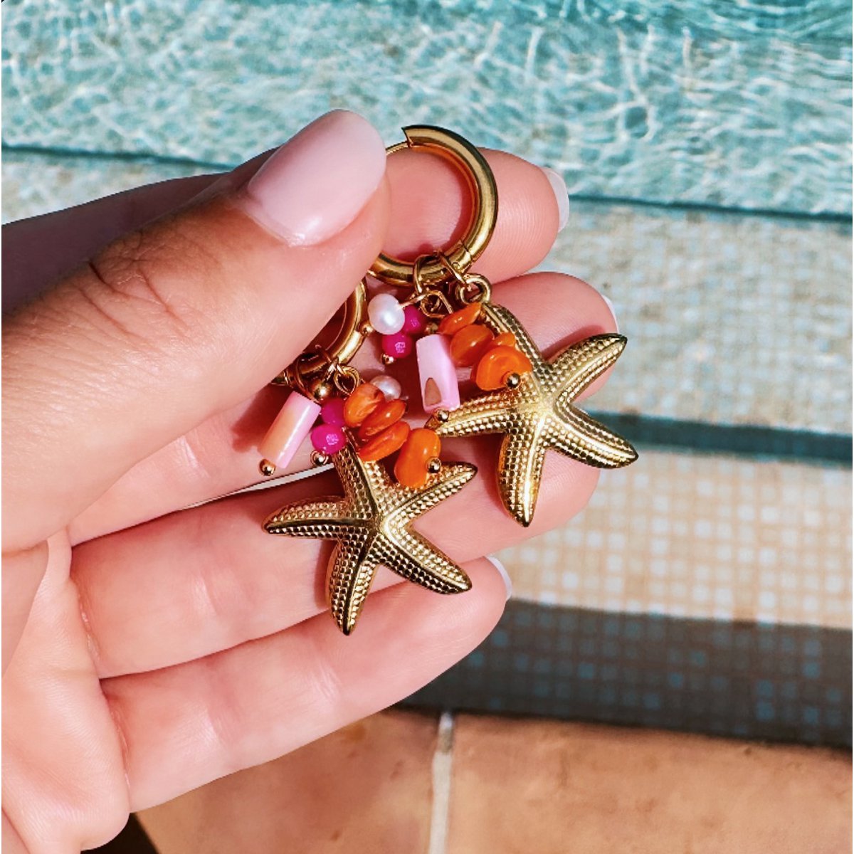 Oorbellen met edelstenen en zeesterren - goud