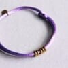 Satijnen armband met ringen – lila