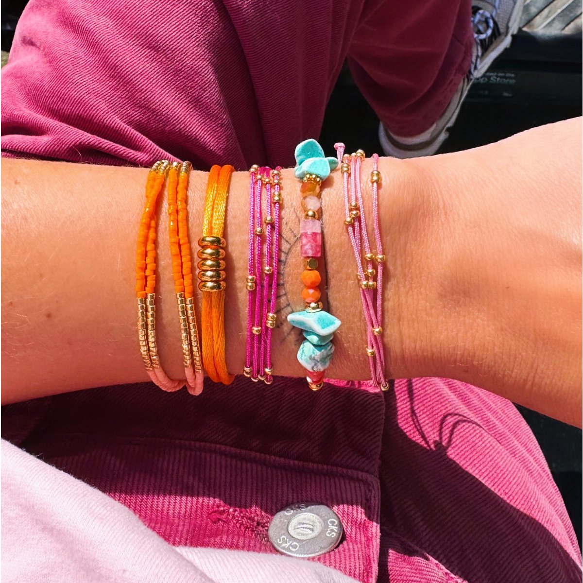 Elastische armband met hartjes - Fuchsia