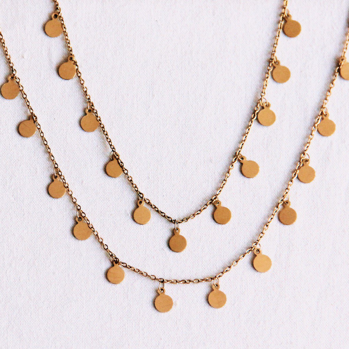 Lange ketting met muntjes - goud