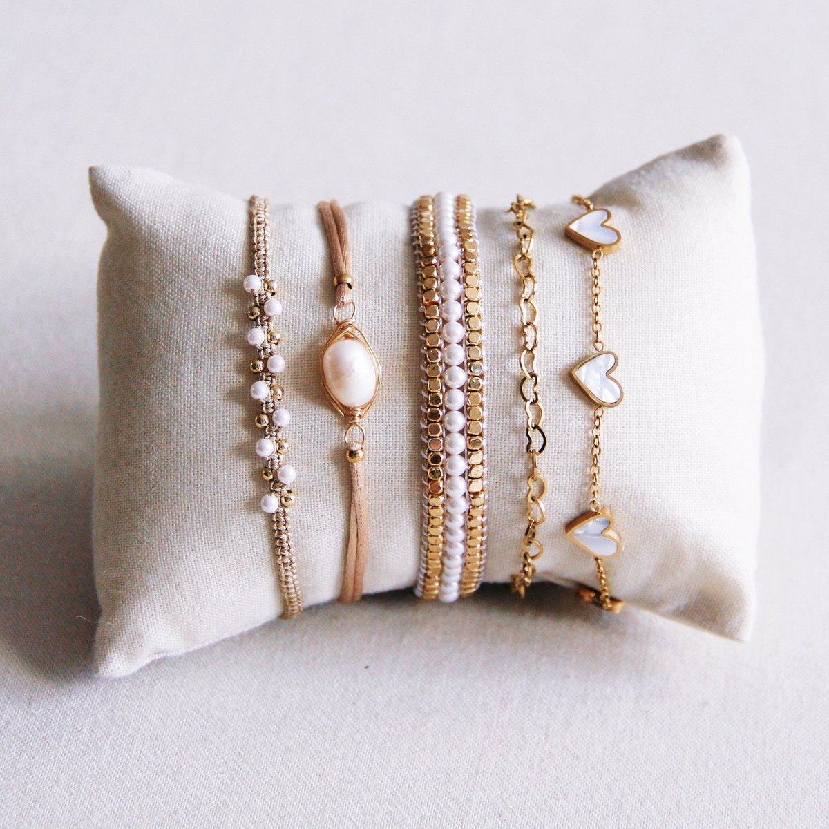 Armband schakel hartjes - goud