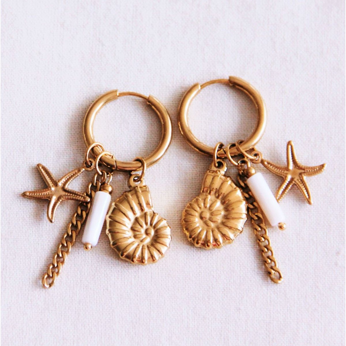Earring with charms