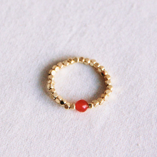 Elastische ring met steen - oranje/goud