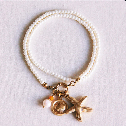 Parelketting met bedels