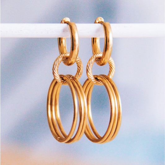 Hanging statement earrings round - gold